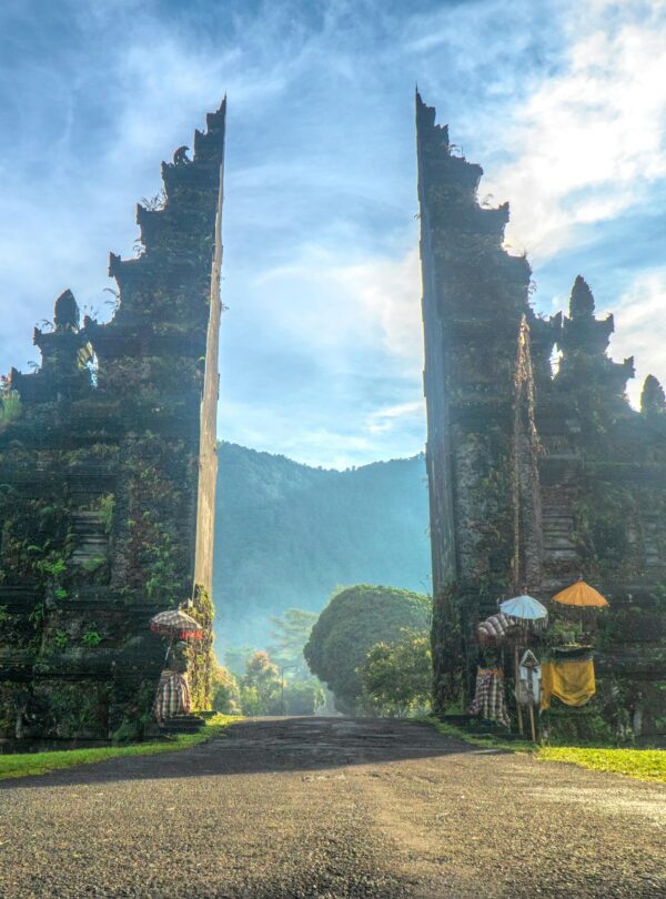 Stunning view of the Handara Gate in Bali with mountains and lush greenery.