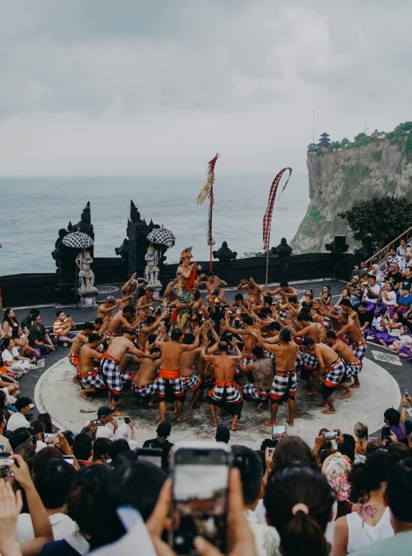 Bali's iconic Kecak dance performed at an open-air amphitheater overlooking the ocean.